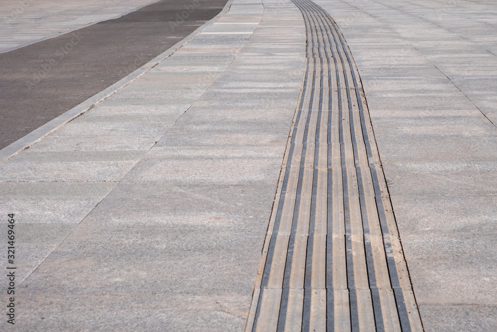 Fototapeta premium Sidewalk guide for blind people.