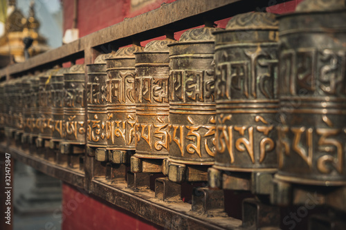 Buddhist prayer wheel at Swayambunath stupa, monkey temple, Kathmandu, Nepal
