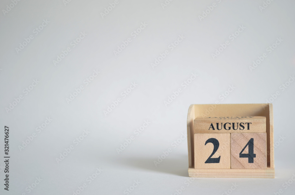 August 24, Empty white background with number cube on the table. August 24, Empty white background with number cube on the table.
