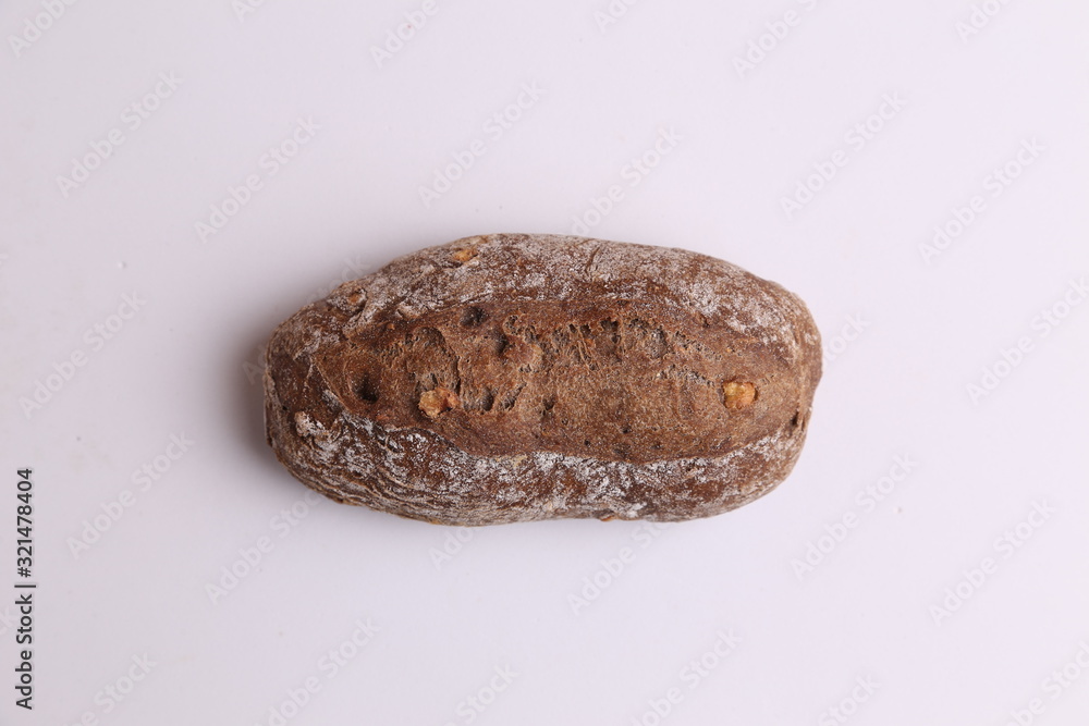 artisanal brown bread with nut pieces artisanal brown bread with nut pieces