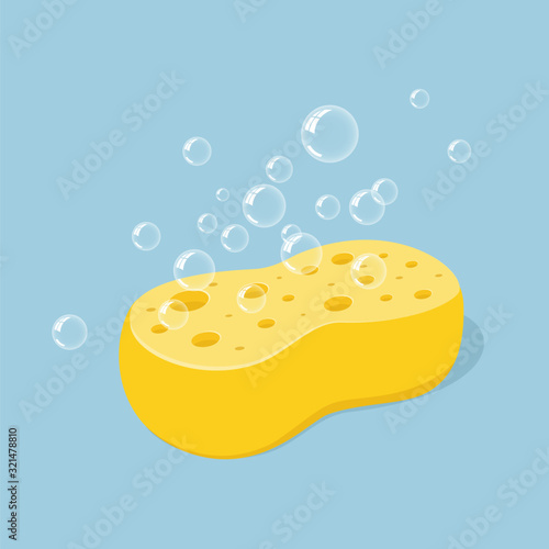 Yellow sponge for washing or cleaning with foam bubbles. Vector illustration in cartoon style, icon isolated photo
