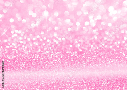 Pink texture background with glitter sparkles. Festive glitter background.