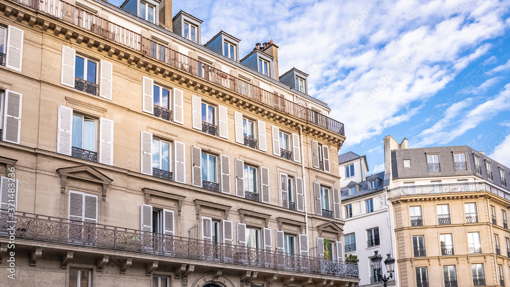 Fototapeta premium Paris, typical facade and windows, beautiful buildings in the Marais