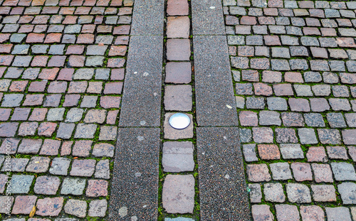 Detailed close up view on cobblestone street textures in high resolution photo