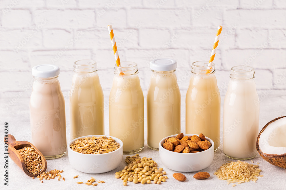 A bottles of alternative milk and ingredient A bottles of alternative milk and ingredient