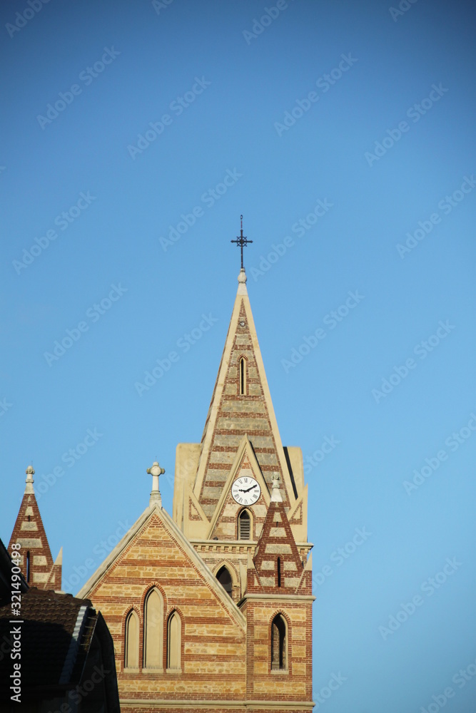Striped bricks clock tower church Striped bricks clock tower church