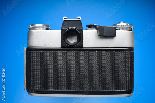  old camera on a blue background