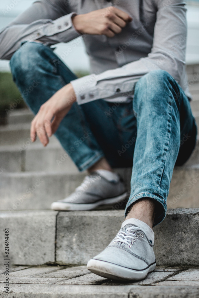 man sitting on stairs man sitting on stairs