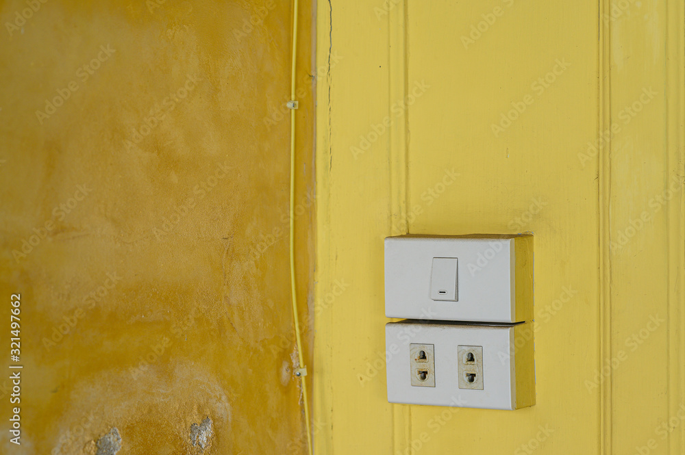 Old light switch on the wall Old light switch on the wall