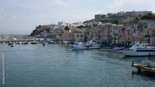 Campi Flegrei, Naples, Campania, Italy -  Decemeber 5 2019: the pastel colors of Marina Corricella in the port of Procida photo