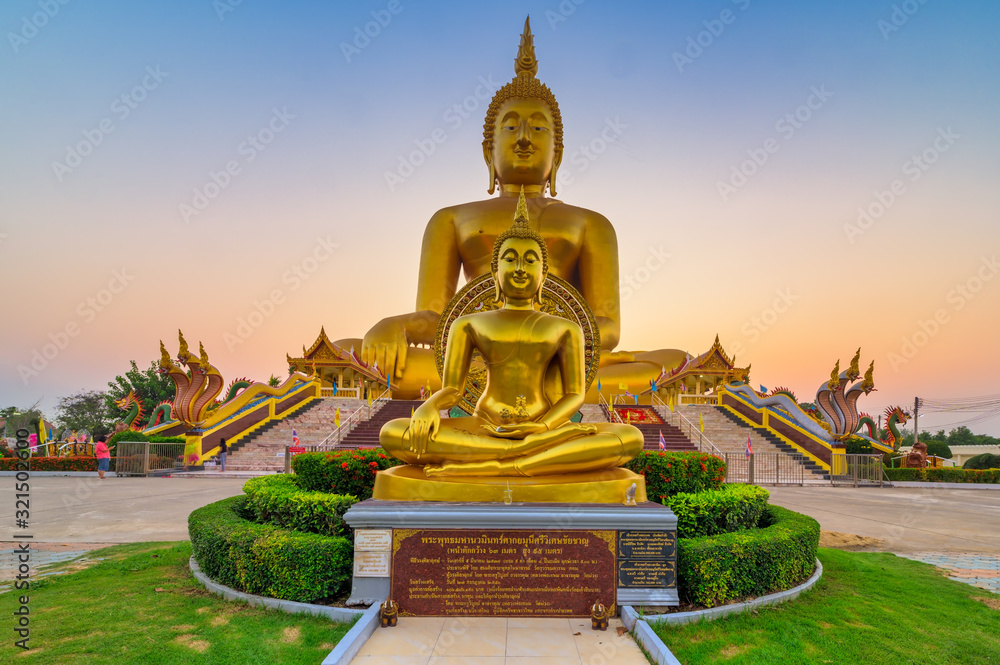 Wiset Chai Chan District, Ang Thong,Thailand, Febuary 2, 2020 : Wat Muang, Monastery & temple complex that is home to a 92-m.-tall statue of the sitting Buddha. Wiset Chai Chan District, Ang Thong,Thailand, Febuary 2, 2020 : Wat Muang, Monastery & temple complex that is home to a 92-m.-tall statue of the sitting Buddha.