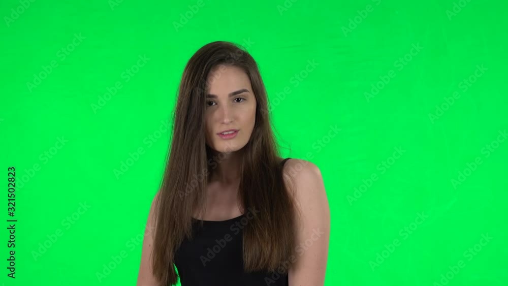Beautiful woman posing at the camera. Green screen Beautiful woman posing at the camera. Green screen