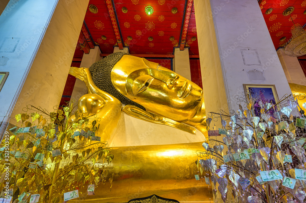 Mueang Sing Buri District, Sing Buri, Thailand, Febuary 1, 2020 : Wat Phra Non Chakkrasi Worawihan is a huge Sukhothai-style reclining Buddha image, which is revered by the local people.
