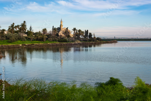 Hala Sultan Tekke or Mosque of Umm Haram with Larnaca Salt Lake in the foreground