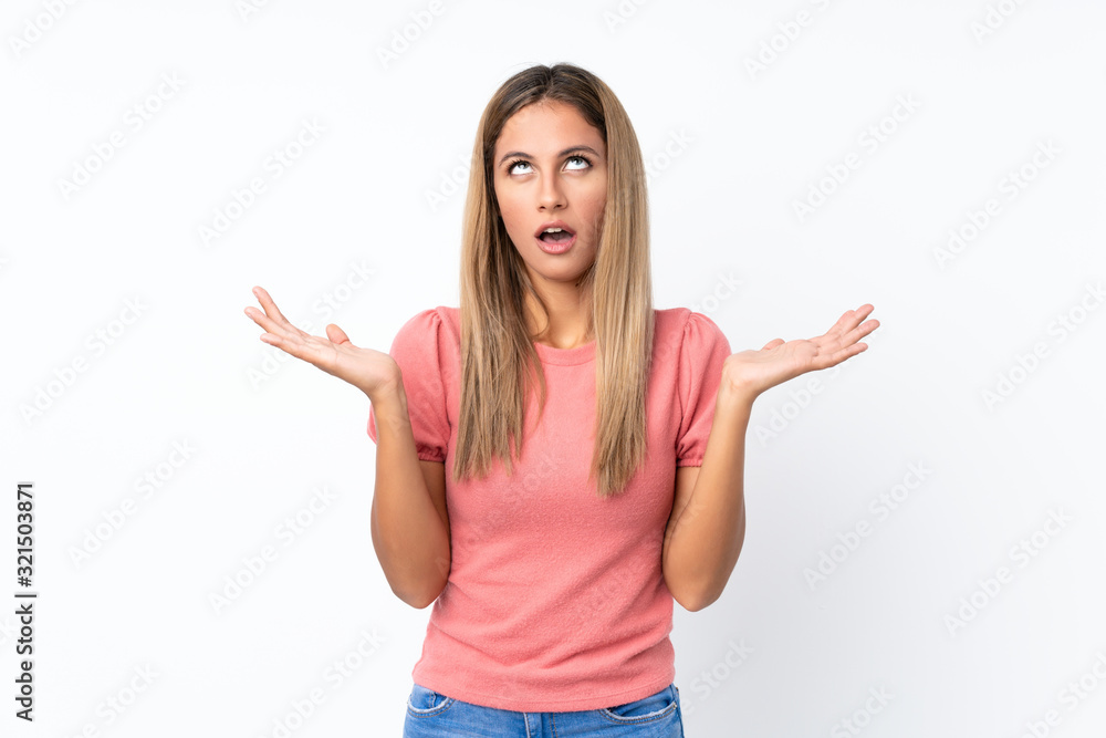 Young blonde woman over isolated white background frustrated by a bad situation Young blonde woman over isolated white background frustrated by a bad situation