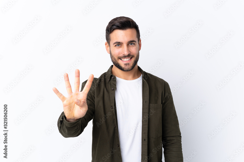 Young handsome man with beard over isolated white background happy and counting four with fingers Young handsome man with beard over isolated white background happy and counting four with fingers