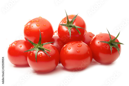 Fresh tomatoes with drops of water isolated photo