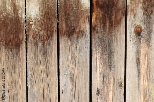 Old wooden board, wood wall. Brown weathered panels texture with knots for background