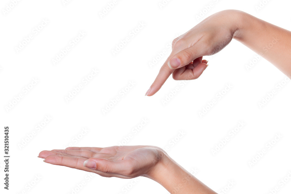 Woman's hand points a finger at another isolated on white