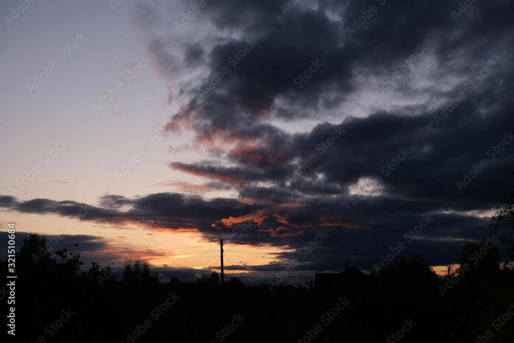 cloudscape with white altocumulus clouds at evening