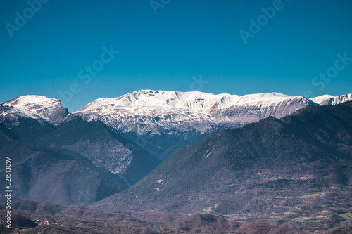 the mountain in Greece is starting to have some snow on the top 