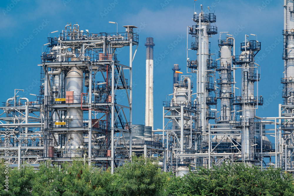 Industrial zone,The equipment of oil refining,Close-up of industrial pipelines of an oil-refinery plant,Detail of oil pipeline with valves in large oil refinery.