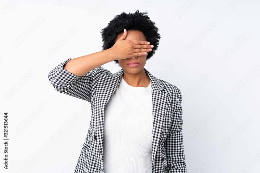 African american woman with blazer over isolated white background covering eyes by hands. Do not want to see something African american woman with blazer over isolated white background covering eyes by hands. Do not want to see something