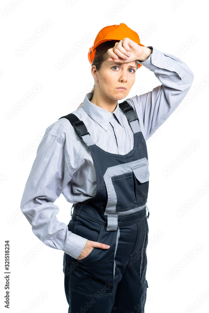 Woman builder engineer tired of work. Isolated Woman builder engineer tired of work. Isolated
