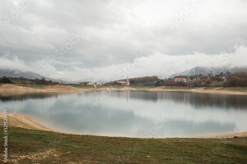 Landscape photo of Rama lake in Bosnia and Herzegovina. Rainy day with heavy clouds, after windstorm. 