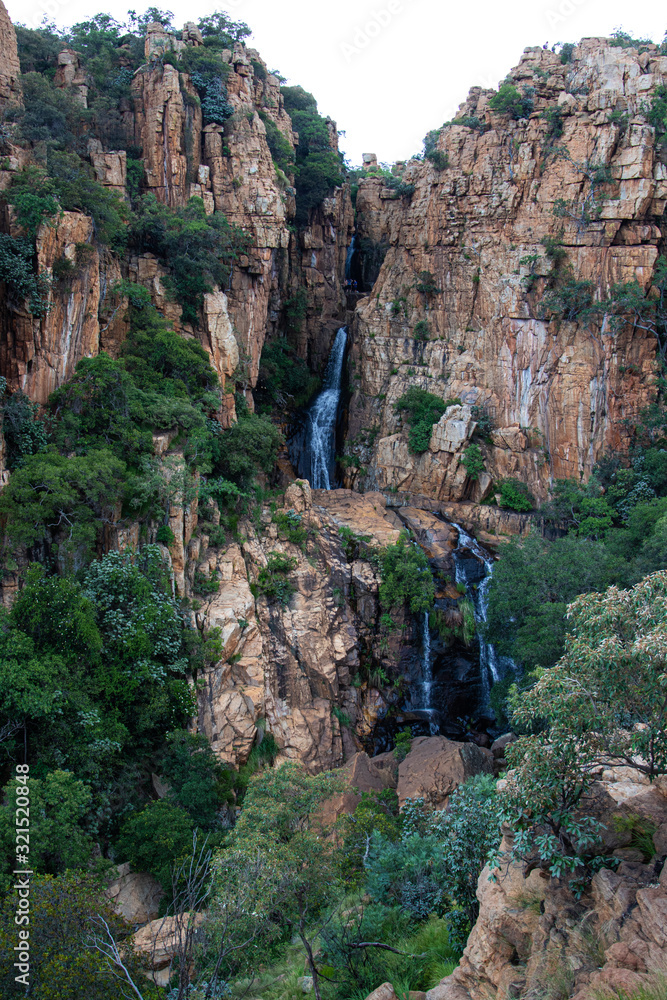 Naklejka premium waterfall within the Magaliesberg Mountain range