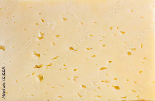 Cheese close-up. Background of cheese. Copy space