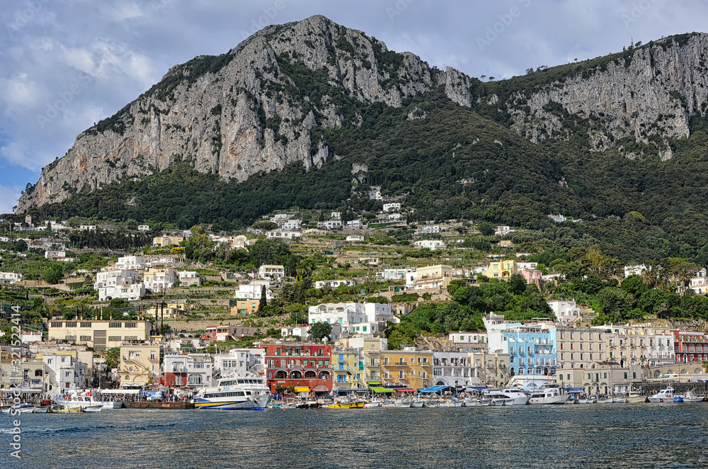 landscape of Capri port island and hills in Italy