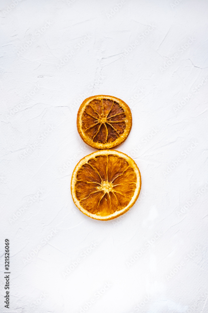 Dried slices of orange in the shape of the number eight. The concept of international women's day. Dried slices of orange in the shape of the number eight. The concept of international women's day.