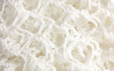White knitted delicate texture, background. Fashion pattern modern, photo backdrop surface empty