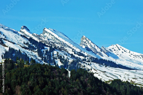 Mountain massive Churfirsten in early spring, between river valleys Thurtal and Seeztal, Wildhaus - Canton of St. Gallen, Switzerland photo