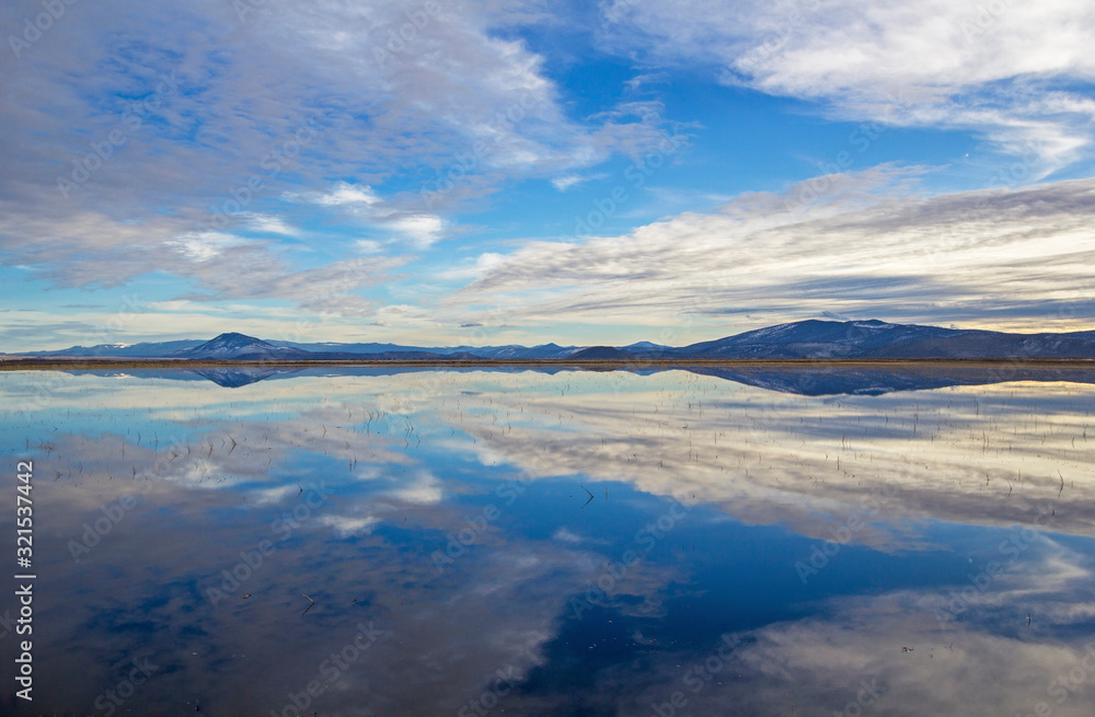 Clouds reflected over lake in Klamath NWR, Oregon