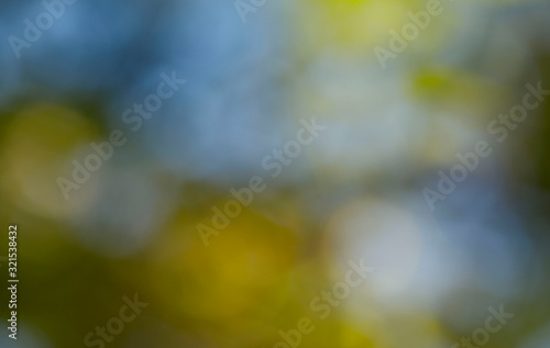 Bokeh Background. Blurry abstract yellow and blue colors. Colorful abstract background. Background texture. Abstract blue with yellow background. Blur image of yellow light. Blurry lights.