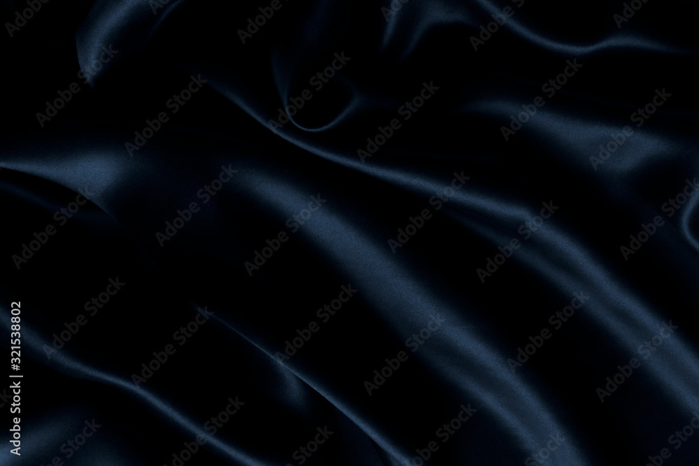 Obraz premium Satin blue silk background, close-up