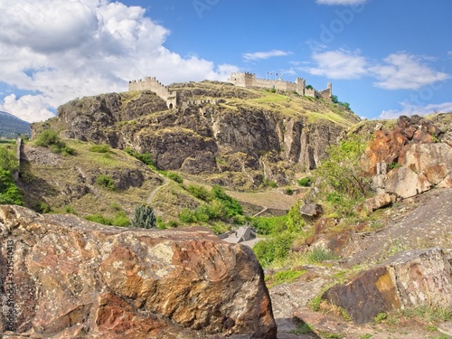 A panoramic view on the historic ruins of Castle Tourbillon near Sion, Switzerland