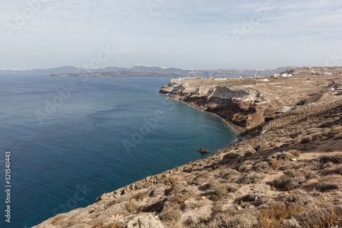 view of the sea and the Caldera of the volcano of Santorini, colorful cliffs and Islands of a beautiful and popular place