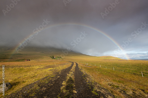 Beautiful rainbow over the Icelandic landscape 