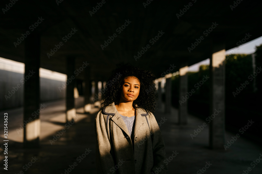 Portrait of a young woman in a parking garage Portrait of a young woman in a parking garage