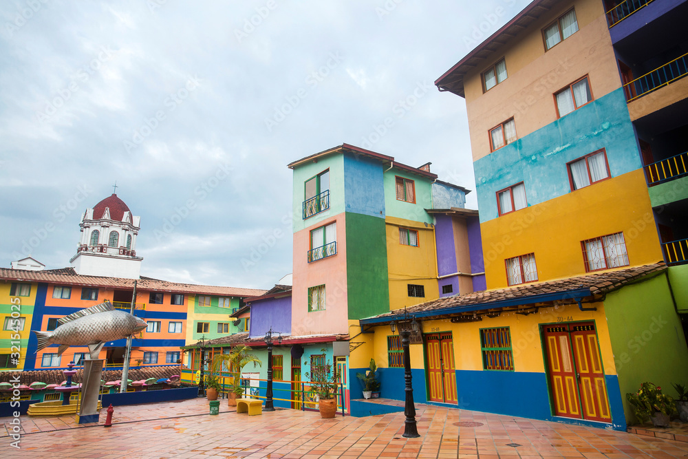 Fototapeta premium Guatape, Antioquia / Colombia - February 02, 2020. It is one of the most colorful towns in Colombia, it reflects it in the form of baseboards and streets full of life.