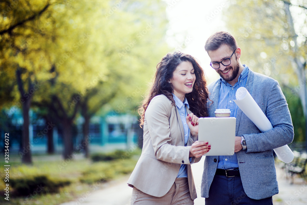 Business woman and male architect discussing Business woman and male architect discussing