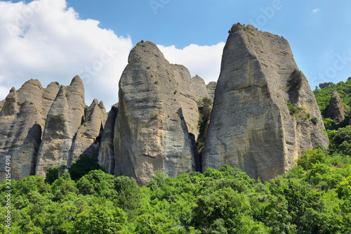 Bild auf Leinwand Unusual Rock Formations known as Penitents, Les Mees, France