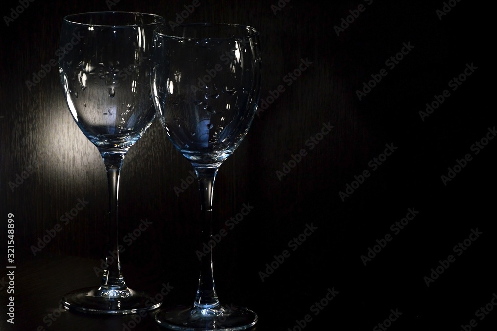 Stylish glass goblets for an evening party or holiday. Items that create a romantic atmosphere