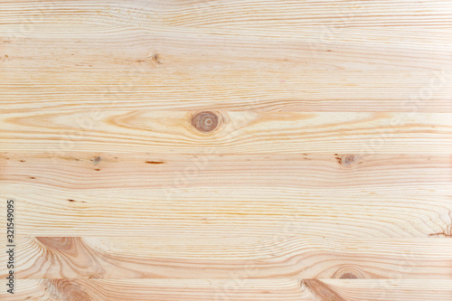 Wooden background from pine boards. The texture of pine-tree wood.