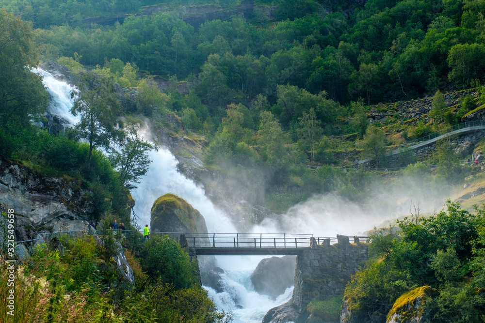 Waterfall created by melting Briksdal glacier, Norway, Scandinavia