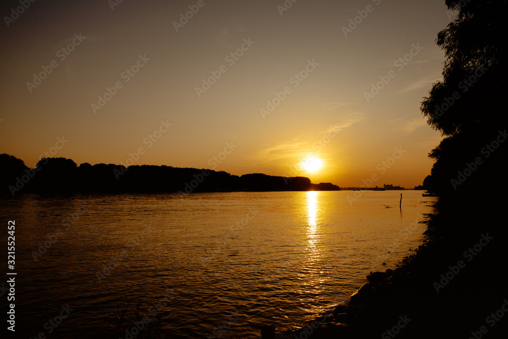 Beautiful romantic sunset on a river