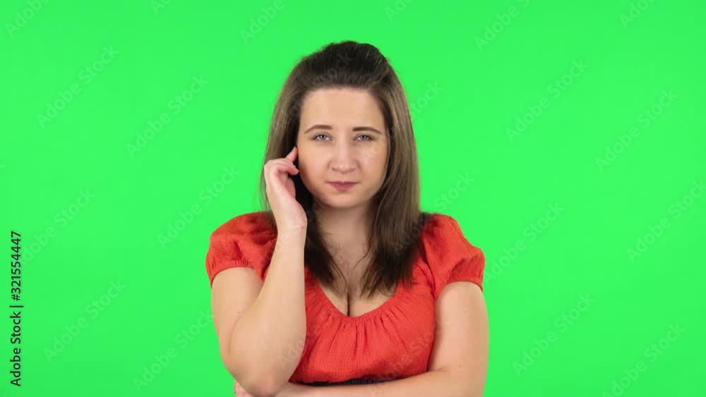 Portrait of cute girl thinking about something, and then an idea coming to her. Green screen Portrait of cute girl thinking about something, and then an idea coming to her. Green screen